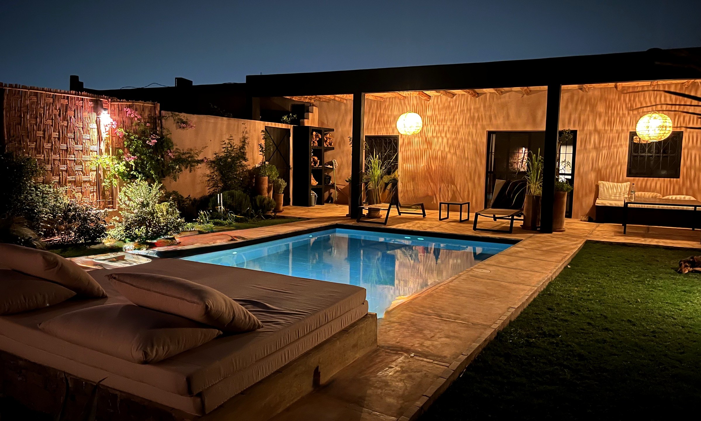 Villa Coco, pool and terrace at dusk